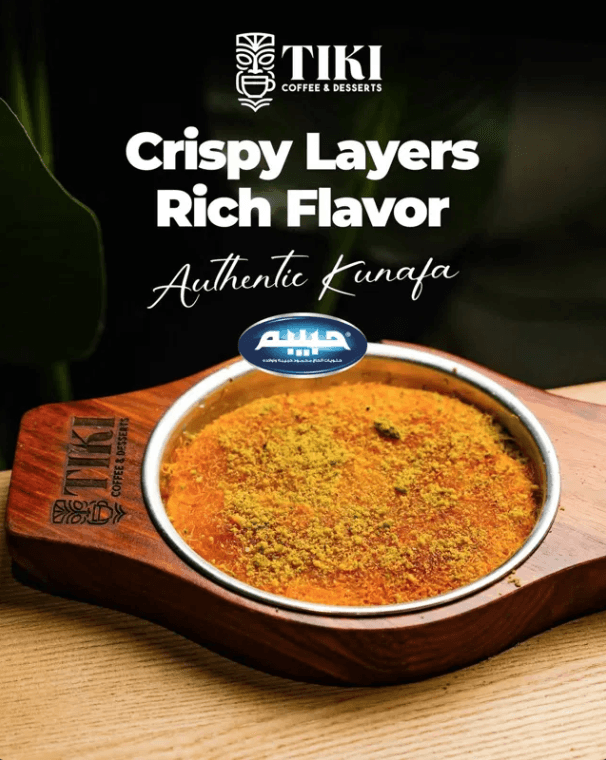 Golden shredded-pastry kunafa topped with crushed green pistachio, served warm